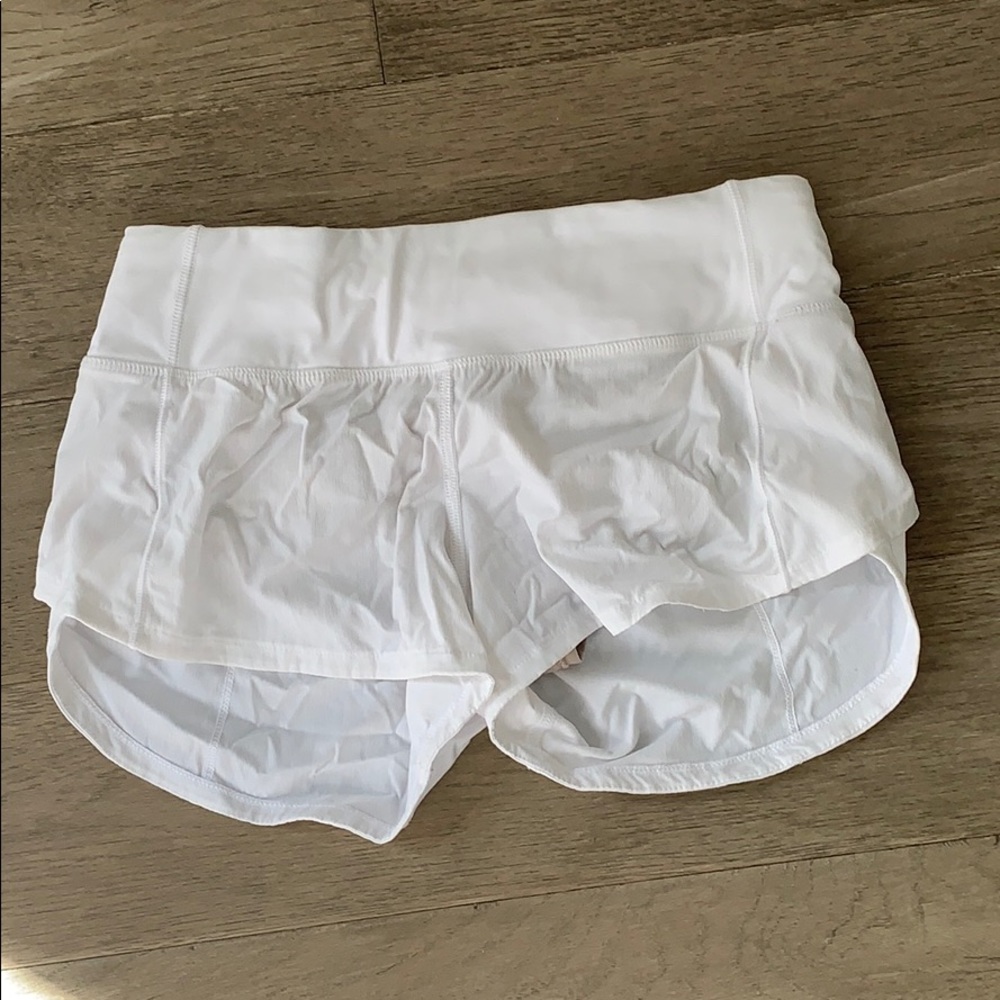 white lululemon running shorts
